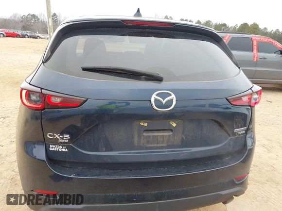 2022 Mazda CX-5 2.5 Turbo with VIN JM3KFBAY5N0521947, listed as a IAAI auction lot 41424202 with 43,961 mi miles and . Bid and sale history available at carsss.com. Image 16.