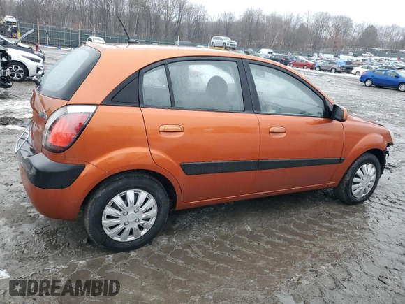 2009 Kia Rio LX with VIN KNADE243396530327, listed as a Copart auction lot 44631785 with 123,170 mi miles and Salvage Title. Bid and sale history available at carsss.com. Image 3.