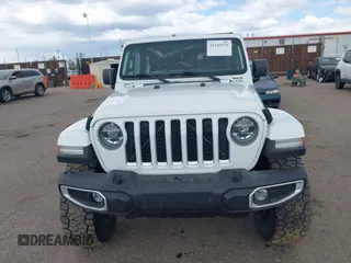 2021 Jeep Gladiator High Altitude z VIN 1C6HJTFG2ML567988, wystawiony jako IAAI lot #42103576 z przebiegiem 74 849 mil mil oraz . Historia ofert i sprzedaży dostępna na DreamBid. Obrazek 12.