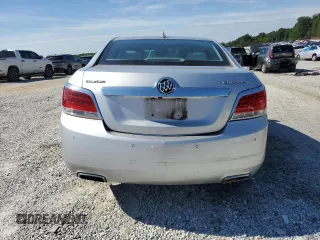 2013 Buick LaCrosse Leather с VIN 1G4GC5E35DF265047, выставлен на аукционе Copart как лот 55631635 с пробегом 103 520 миль миль и Списание • Salvage title. История ставок и продаж доступна на DreamBid. Изображение 6.