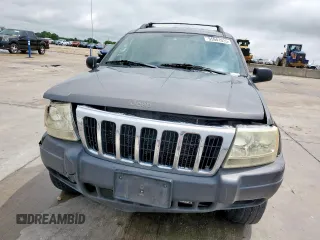 2003 Jeep Grand Cherokee Laredo with VIN 1J4GW48SX3C569087, listed as a Copart auction lot 55941035 with Not provided miles and Salvage title. Bid and sale history available at DreamBid. Image 5.