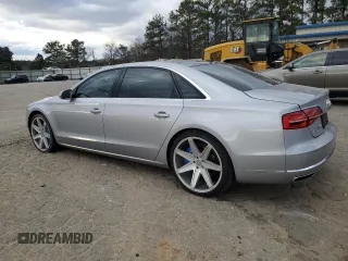 2016 Audi A8 3.0T with VIN WAU34AFD6GN010205, listed as a Copart auction lot 82362184 with 118,464 mi miles and Salvage Title. Bid and sale history available at DreamBid. Image 2.