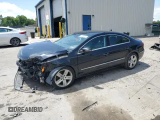 2013 Volkswagen CC Sport z VIN WVWBP7AN2DE512858, wystawiony jako Copart lot #59898415 z przebiegiem 134 461 mil mil oraz Szkoda całkowita • Salvage title. Historia ofert i sprzedaży dostępna na DreamBid. Obrazek 1.