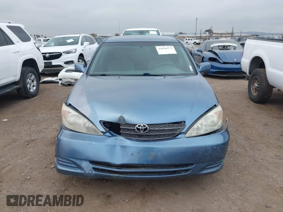 2004 Toyota Camry LE with VIN 4T1BF32K54U572537, listed as a IAAI auction lot 41850322 with 167,076 mi miles and . Bid and sale history available at DreamBid. Image 12.