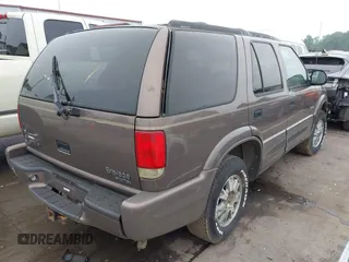 1998 Oldsmobile Bravada z VIN 1GHDT13W6W2727777, wystawiony jako IAAI lot #42103153 z przebiegiem 187 176 mil mil oraz . Historia ofert i sprzedaży dostępna na DreamBid. Obrazek 4.