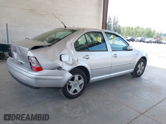 2000 Volkswagen Jetta GLS z VIN 3VWSA29M4YM195775, wystawiony jako IAAI lot #42131518 z przebiegiem 314 472 mil mil oraz . Historia ofert i sprzedaży dostępna na DreamBid. Obrazek 4.