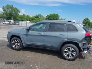 2014 Jeep Cherokee Trailhawk z VIN 1C4PJMBS4EW236950, wystawiony jako IAAI lot #42636128 z przebiegiem 170 491 mil mil oraz . Historia ofert i sprzedaży dostępna na DreamBid. Obrazek 15.