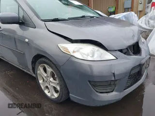 2009 Mazda 5 Touring with VIN JM1CR29L690356302, listed as a IAAI auction lot 41573737 with 127,276 mi miles. Bid and sale history available at carsss.com. Image 13.