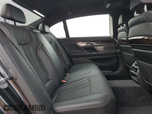 2019 BMW 7 Series 740i xDrive with VIN WBA7E4C51KGV70031, listed as a Copart auction lot 38008974 with 33,555 mi miles and . Bid and sale history available at DreamBid. Image 10.