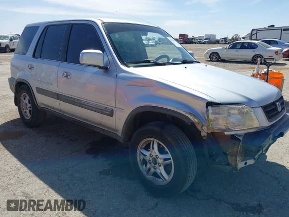1999 Honda CR-V EX with VIN JHLRD1861XC025446, listed as a IAAI auction lot 41852155 with 201,598 mi miles. Bid and sale history available at carsss.com. Image 1.