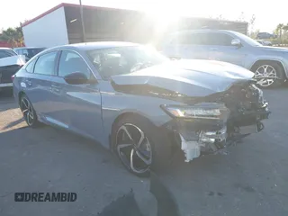 2022 Honda Accord Sport z VIN 1HGCV1F35NA117128, wystawiony jako IAAI lot #40957497 z przebiegiem 29 636 mil mil oraz . Historia ofert i sprzedaży dostępna na DreamBid. Obrazek 1.