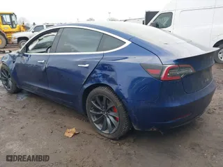 2018 Tesla Model 3 Long Range Battery with VIN 5YJ3E1EB2JF180275, listed as a IAAI auction lot 41196064 with 110,535 mi miles. Bid and sale history available at carsss.com. Image 3.