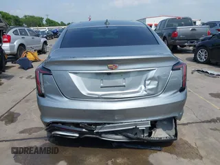 2023 Cadillac CT5 Sport z VIN 1G6DP5RK7P0113696, wystawiony jako IAAI lot #41904906 z przebiegiem 89 191 mil mil oraz . Historia ofert i sprzedaży dostępna na DreamBid. Obrazek 19.