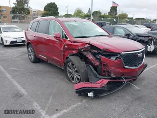 2020 Cadillac XT6 FWD Premium Luxury with VIN 1GYKPCRSXLZ133207, listed as a IAAI auction lot 41733269 with 82,853 mi miles. Bid and sale history available at carsss.com. Image 1.