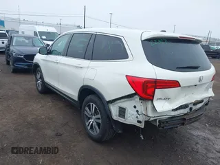 2018 Honda Pilot EX-L with VIN 5FNYF6H52JB053046, listed as a IAAI auction lot 42013210 with 103,721 mi miles. Bid and sale history available at carsss.com. Image 3.