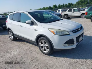 2014 Ford Escape SE z VIN 1FMCU9GX6EUB22933, wystawiony jako IAAI lot #42409810 z przebiegiem 152 602 mil mil oraz . Historia ofert i sprzedaży dostępna na DreamBid. Obrazek 1.