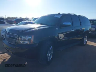 2008 Chevrolet Suburban LTZ with VIN 3GNFK16338G304546, listed as a IAAI auction lot 41404453 with 174,443 mi miles. Bid and sale history available at carsss.com. Image 2.