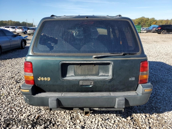 1993 Jeep Grand Cherokee Limited with VIN 1J4GZ78Y3PC557480, listed as a Copart auction lot 80325334 with 96,105 mi miles and Salvage Title. Bid and sale history available at carsss.com. Image 6.