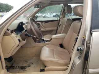 2001 Mercedes-Benz E-Class with VIN WDBJF65J01B389296, listed as a Copart auction lot 71933404 with 124,392 mi miles and Salvage Title. Bid and sale history available at carsss.com. Image 7.