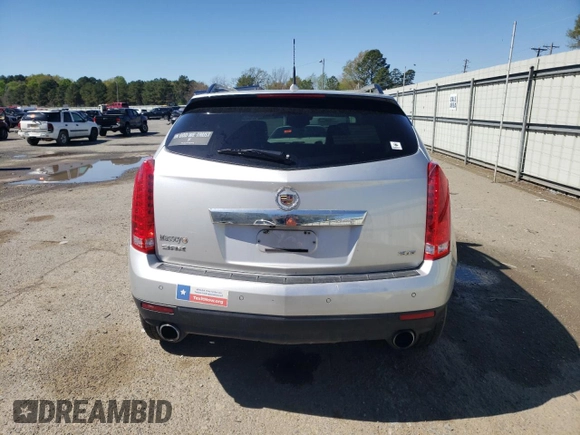 2014 Cadillac SRX Performance Collection z VIN 3GYFNCE38ES559239, wystawiony jako Copart lot #49843955 z przebiegiem 99 497 mil mil oraz Szkoda całkowita • Salvage title. Historia ofert i sprzedaży dostępna na DreamBid. Obrazek 6.