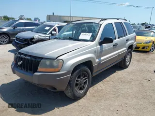 2004 Jeep Grand Cherokee Laredo z VIN 1J4GW48SX4C283922, wystawiony jako IAAI lot #42306869 z przebiegiem 263 812 mil mil oraz . Historia ofert i sprzedaży dostępna na DreamBid. Obrazek 16.