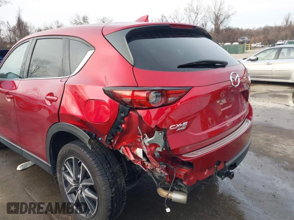 2018 Mazda CX-5 Grand Touring with VIN JM3KFBDM8J0406276, listed as a IAAI auction lot 41447355 with 70,772 mi miles. Bid and sale history available at carsss.com. Image 17.