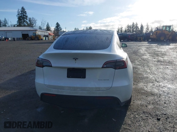 2024 Tesla Model Y Long Range with VIN 7SAYGDEE1RF056816, listed as a IAAI auction lot 41809125 with 6,434 mi miles and . Bid and sale history available at DreamBid. Image 17.