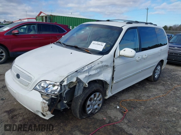2005 Kia Sedona LX with VIN KNDUP132356708456, listed as a IAAI auction lot 41220936 with 172,960 mi miles. Bid and sale history available at carsss.com. Image 2.