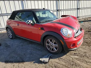2013 MINI Convertible with VIN WMWZN3C58DT265980, listed as a Copart auction lot 77157154 with 88,975 mi miles and Salvage title. Bid and sale history available at DreamBid. Image 4.