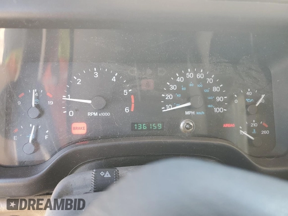 2000 Jeep Wrangler Sahara with VIN 1J4FA59SXYP764539, listed as a Copart auction lot 52707385 with 136,159 mi miles and Salvage title. Bid and sale history available at DreamBid. Image 9.