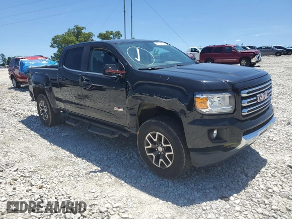 2015 GMC Canyon 4WD SLE with VIN 1GTG6BE32F1115990, listed as a Copart auction lot 71295314 with 118,913 mi miles and Salvage Title. Bid and sale history available at carsss.com. Image 7.