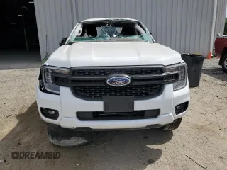 2024 Ford Ranger XL with VIN 1FTER4PH3RLE48663, listed as a Copart auction lot 55063265 with 10,666 mi miles and Salvage title. Bid and sale history available at DreamBid. Image 5.