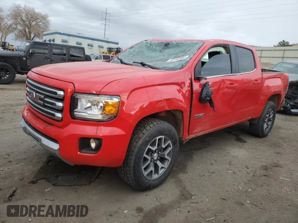 2015 GMC Canyon 4WD SLE with VIN 1GTG6BE30F1136918, listed as a Copart auction lot 82442884 with 102,361 mi miles and Salvage Title. Bid and sale history available at carsss.com. Image 1.