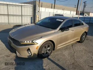 2021 Kia K5 LXS with VIN 5XXG14J2XMG037385, listed as a Copart auction lot 88337485 with 32,515 mi miles and Salvage Title. Bid and sale history available at carsss.com. Image 1.