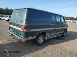1991 GMC Vandura z VIN 1GDEG25K6M7504729, wystawiony jako Copart lot #71146614 z przebiegiem 181 800 mil mil oraz Tytuł czysty. Historia ofert i sprzedaży dostępna na DreamBid. Obrazek 3.