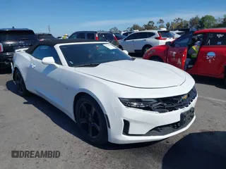 2020 Chevrolet Camaro 1LT with VIN 1G1FB3DX6L0111596, listed as a IAAI auction lot 42216683 with 51,046 mi miles and . Bid and sale history available at DreamBid. Image 1.