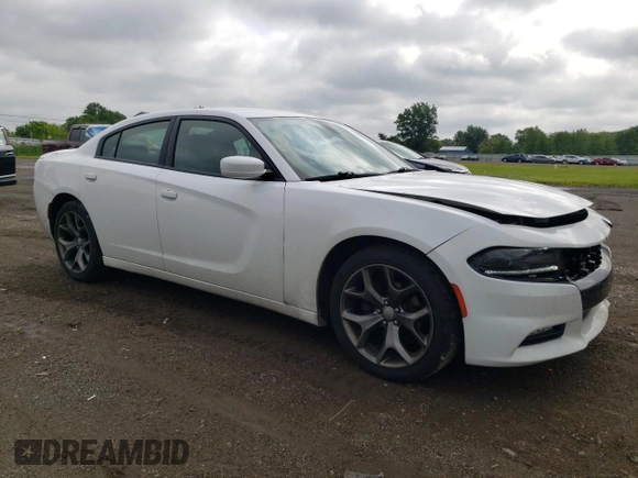 2015 Dodge Charger SXT with VIN 2C3CDXHG4FH832400, listed as a Copart auction lot 61493795 with 134,582 mi miles and Salvage title. Bid and sale history available at DreamBid. Image 4.