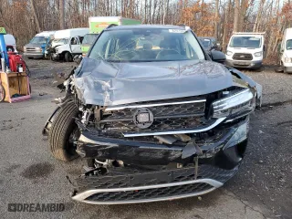 2024 Volkswagen Taos S with VIN 3VV8X7B2XRM080392, listed as a Copart auction lot 82410604 with 6,966 mi miles and Salvage Title. Bid and sale history available at carsss.com. Image 5.