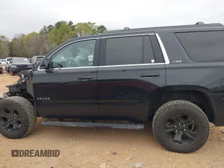 2017 Chevrolet Tahoe LT with VIN 1GNSKBKCXHR388181, listed as a IAAI auction lot 41936609 with 94,783 mi miles and . Bid and sale history available at DreamBid. Image 15.