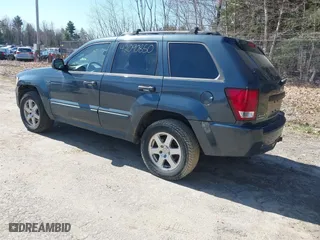 2008 Jeep Grand Cherokee Laredo with VIN 1J8GR48K98C161239, listed as a IAAI auction lot 42090850 with 218,063 mi miles. Bid and sale history available at carsss.com. Image 3.