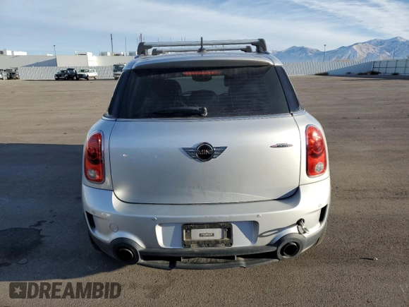2015 MINI Countryman John Cooper Works with VIN WMWXD1C53FWS34815, listed as a Copart auction lot 74667224 with 94,971 mi miles and Salvage Title. Bid and sale history available at DreamBid. Image 6.