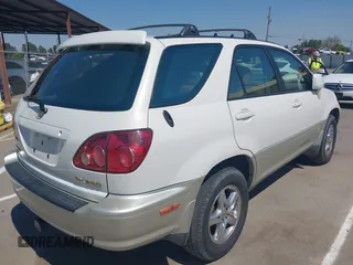 1999 Lexus RX 300 Luxury SUV with VIN JT6HF10U7X0091375, listed as a IAAI auction lot 42119385 with 271,971 mi miles. Bid and sale history available at carsss.com. Image 4.