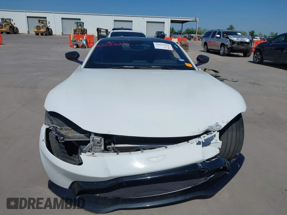 2019 Aston Martin Vantage z VIN SCFSMGAW4KGN01848, wystawiony jako IAAI lot #42032076 z przebiegiem 54 469 mil mil oraz . Historia ofert i sprzedaży dostępna na DreamBid. Obrazek 13.