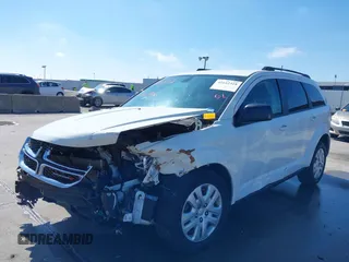 2019 Dodge Journey SE Value with VIN 3C4PDCAB1KT868065, listed as a IAAI auction lot 41642318 with 97,735 mi miles and . Bid and sale history available at DreamBid. Image 2.