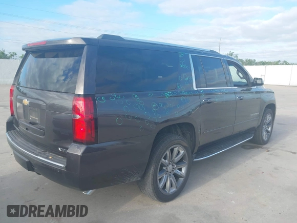 2018 Chevrolet Suburban Premier with VIN 1GNSCJKC5JR135265, listed as a IAAI auction lot 42028935 with 136,382 mi miles and . Bid and sale history available at DreamBid. Image 4.