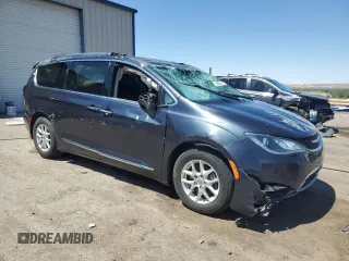 2020 Chrysler Pacifica Touring L with VIN 2C4RC1BG2LR209328, listed as a Copart auction lot 55634475 with 156,604 mi miles and Salvage title. Bid and sale history available at DreamBid. Image 4.