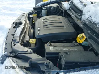 2014 Dodge Grand Caravan SXT with VIN 2C4RDGBG1ER420765, listed as a IAAI auction lot 40986661 with 167,365 mi miles and . Bid and sale history available at DreamBid. Image 12.