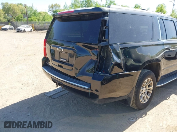 2016 Chevrolet Suburban LTZ with VIN 1GNSKJKC5GR328723, listed as a IAAI auction lot 42253610 with 183,423 mi miles and . Bid and sale history available at DreamBid. Image 6.