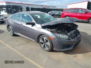 2016 Honda Civic Sedan EX-T with VIN 19XFC1F39GE031760, listed as a IAAI auction lot 41776674 with 91,301 mi miles. Bid and sale history available at carsss.com. Image 1.