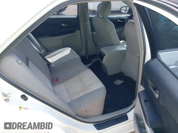 2014 Toyota Camry L with VIN 4T4BF1FK2ER375590, listed as a IAAI auction lot 42101553 with 126,849 mi miles and . Bid and sale history available at DreamBid. Image 8.